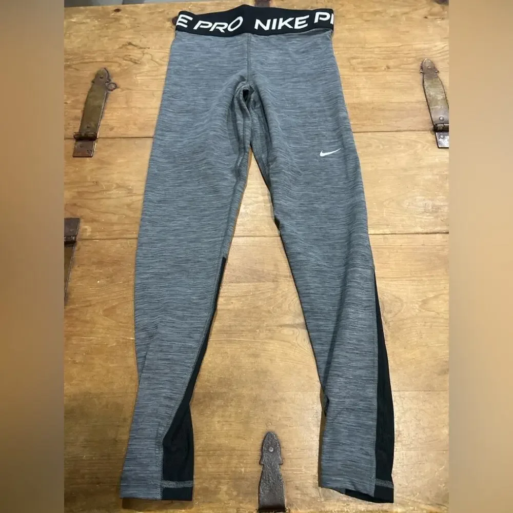 Woman’s Nike Pro Heather Gray with black mesh Leggings Size Small